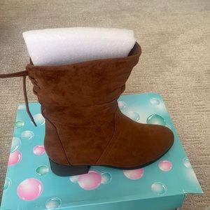 Super cute short fall bootie. Brand new never been worn.